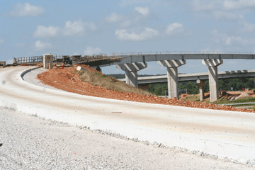 Contractor crews have poured concrete for a portion of the roadway