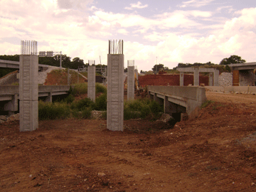 Contractor crews are building columns to support the U.S. 60 bridges over the railroad tracks west of U.S. 65. 